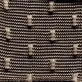 Ribbed fabric with cream swan motifs, dark brown and cream tones, densely knit texture, irregular pattern, handcrafted aesthetic.